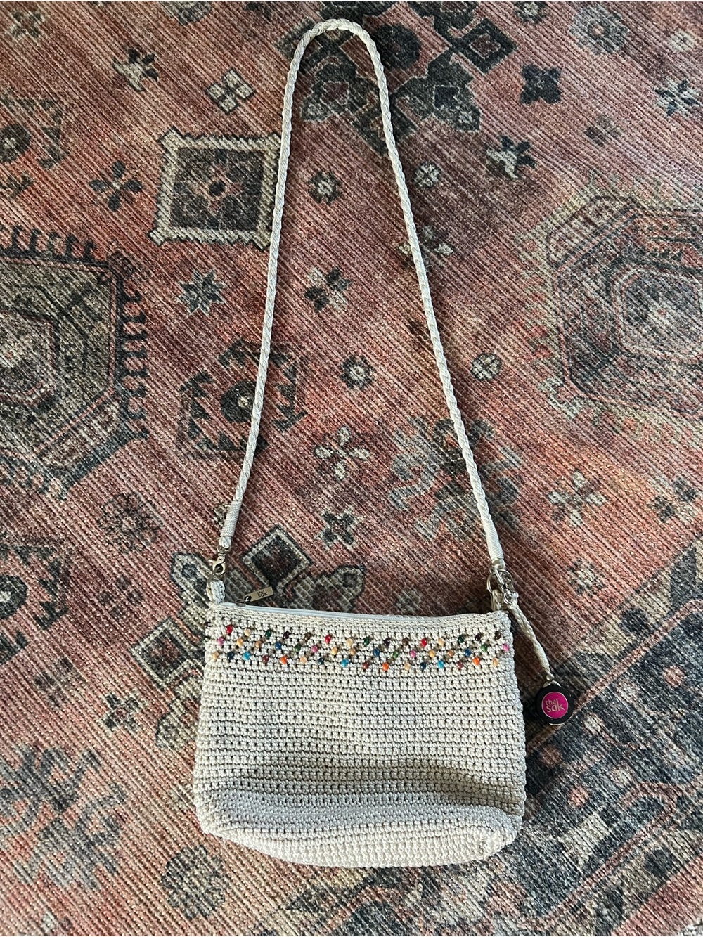 The Sak Cream Crochet Crossbody Bag with Multicolor Bead Accent